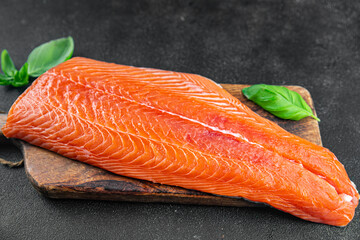 salmon fillet raw red fish seafood appetizer meal food snack on the table copy space food background rustic top view vegetarian food no met Pescetarian