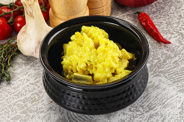 Italian cuisine - yellow risotto with chicken