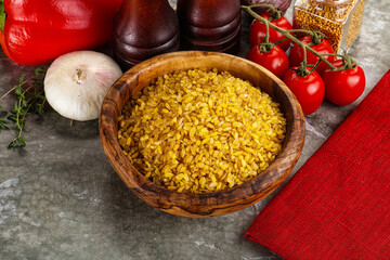 Dry wheat bulgur cereal heap