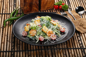 Tasty Caesar salad with prawn