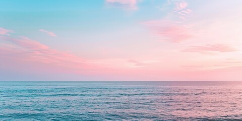 Obraz premium Beautiful ocean with a pink and blue sky background
