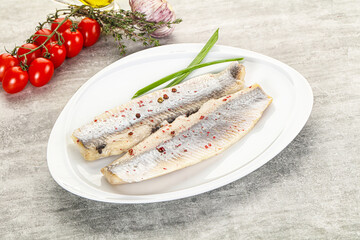 Marinated herring fillet with green onion