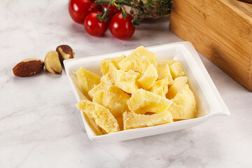 Crushed parmesan cheese in the bowl