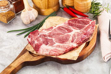 Raw pork neck steak for grill