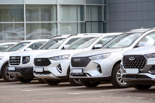 Minsk, Belarus. May 2024. Haval F7, Haval M6, Haval Dargo and Chery, new chinese car parked in row outdoor, brand new cars for sale. Chinese crossover, SUV car Haval for sale