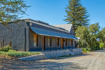 Victorian era building painted grey in Van Wyksdorp in the Little Karoo, Western Cape South Africa