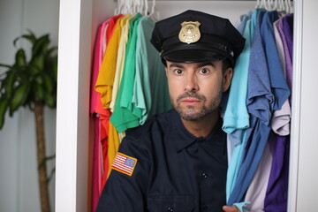 Police officer inside of the closet 