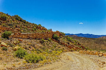 Hairpin bends and stone works on rough Rooiberg Pass between Calitzdorp and Van Wyksdorp in the Little Karoo, Western Cape, South Africa