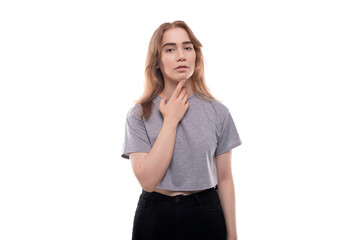 Fototapeta premium Headshot portrait of excited teenage girl in gray t-shirt