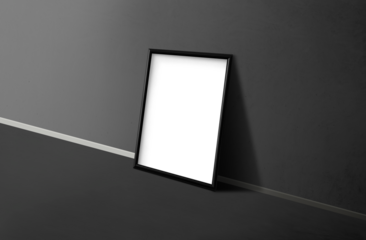 Black picture frame mockup on a dark wall