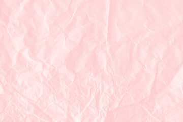 Fototapeta premium Crumpled salmon pink paper textured background design element