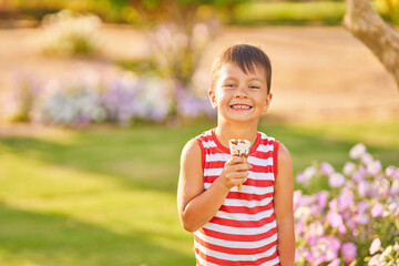 Fototapeta premium Picture of small boy with an ice cream cone