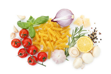 Uncooked fusilli pasta and ingredients on white background, top view