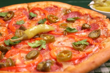 Delicious hot pizza Diablo on table, closeup