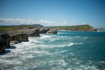 Coastal Seascape with Rugged Cliffs and Dynamic Skies