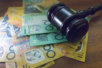 judge gavel and australian money aud Aussie currency