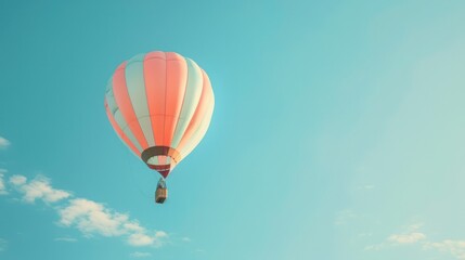 Image of a pastel-colored hot air balloon floating in a clear blue sky, creating a whimsical background --ar 16:9 Job ID: 34947669-120e-4f28-af97-15ed7707b290