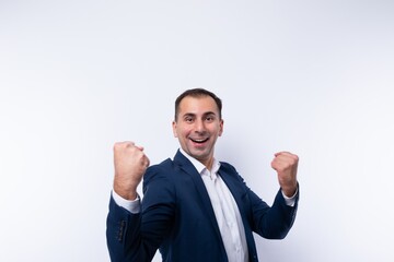 Successful business man in a stylish blue jacket on a white background