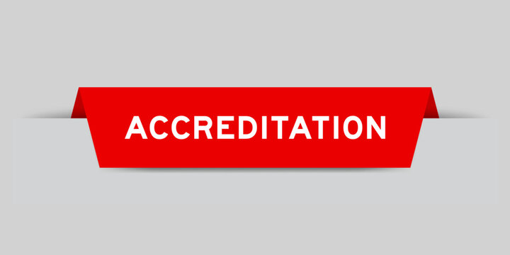 Red color inserted label with word accreditation on gray background