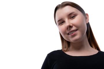 Portrait of a shy preteen girl of European appearance on a white background