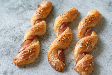 Closed up bacon bread roll on background