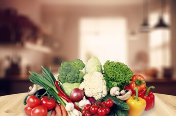 Home kitchen table with fresh vegetables food
