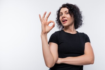 Portrait of a smiling woman with a bioperm dressed in a black T-shirt