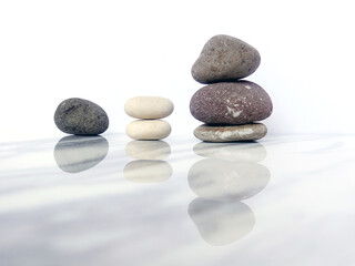 Zen basalt stone on white marble background
