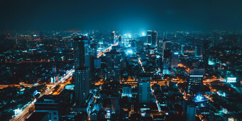 Fototapeta premium High-rise buildings and busy city night