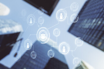 Abstract virtual social network hologram on modern architecture background. Double exposure