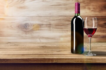 Bottle and glass of tasty red wine