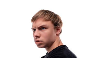 Blonde teenager dressed in a basic t-shirt thinks about a problem