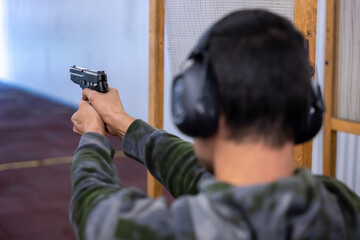 Man Shooting with a Gun in Switzerland.