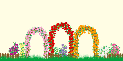 Arches with different climbing roses and fences with rose bushes of different colors