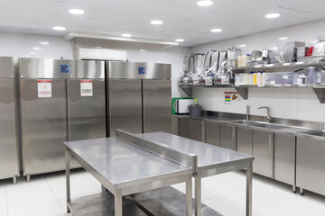 a room with refrigeration equipment for cutting meat.A place to store meat for a restaurant