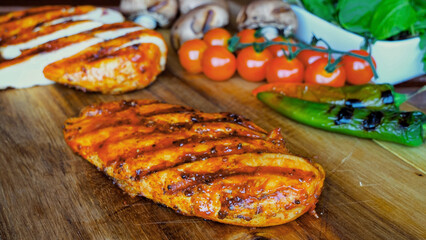 Сhicken breast grill with vegetables on the on a cutting board