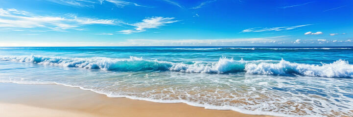 A serene beach scene with the ocean's edge and waves gently lapping against the shore.