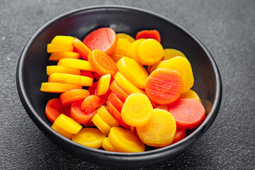 carrot slice colorful vegetable carrots rings salad fresh cooking appetizer meal food snack on the table copy space food background rustic top view