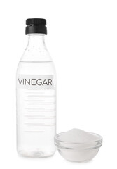 Eco friendly natural cleaners. Vinegar in bottle and bowl of soda isolated on white