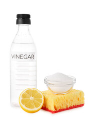 Eco friendly natural cleaners. Vinegar in bottle, cut lemon, sponge and bowl of soda isolated on white
