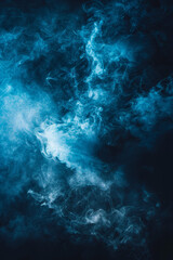Abstract blue smoke swirls against dark background, creating a mysterious and ethereal atmosphere.