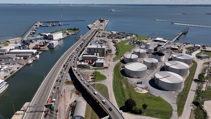 Cars traveling on road that goes into Monitor Merrimac Memorial tunnel that goes under Hampton...