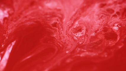 Paint flow. Acrylic fluid wave. Defocused red white color ink swirl liquid dye pigment wet gloss...