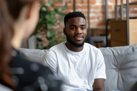 diverse guy at therapy session counseling. June and November - Men's mental health awareness month