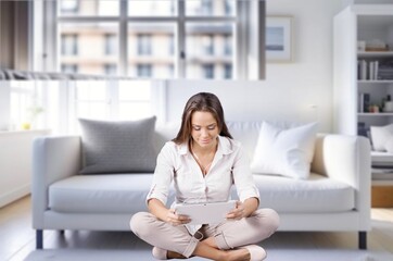 Bored Young Woman Looking At her Smartphone