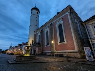 Fototapeta premium Domazlice historical city center and old town square with white tower,church and medieval gates,Chodsko region,Pilsen,Czech republic,panorama cityscape view