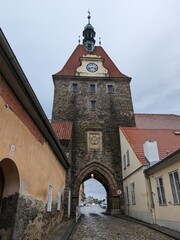Obraz premium Domazlice historical city center and old town square with white tower,church and medieval gates,Chodsko region,Pilsen,Czech republic,panorama cityscape view