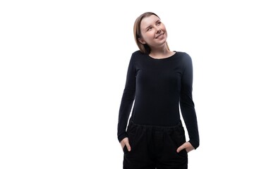 Fototapeta premium Portrait of a smart and cool European schoolgirl on a white background with copyspace