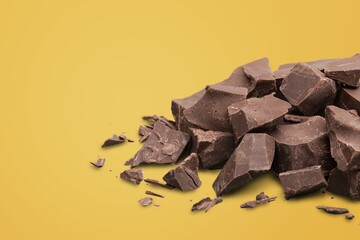Bitten tasty sweet milk chocolate on background