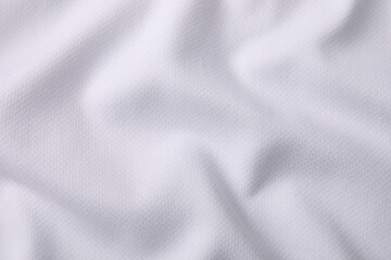 Fototapeta premium Texture of white fabric as background, top view